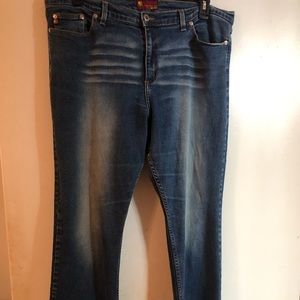 Ladies distressed flare stretch jeans